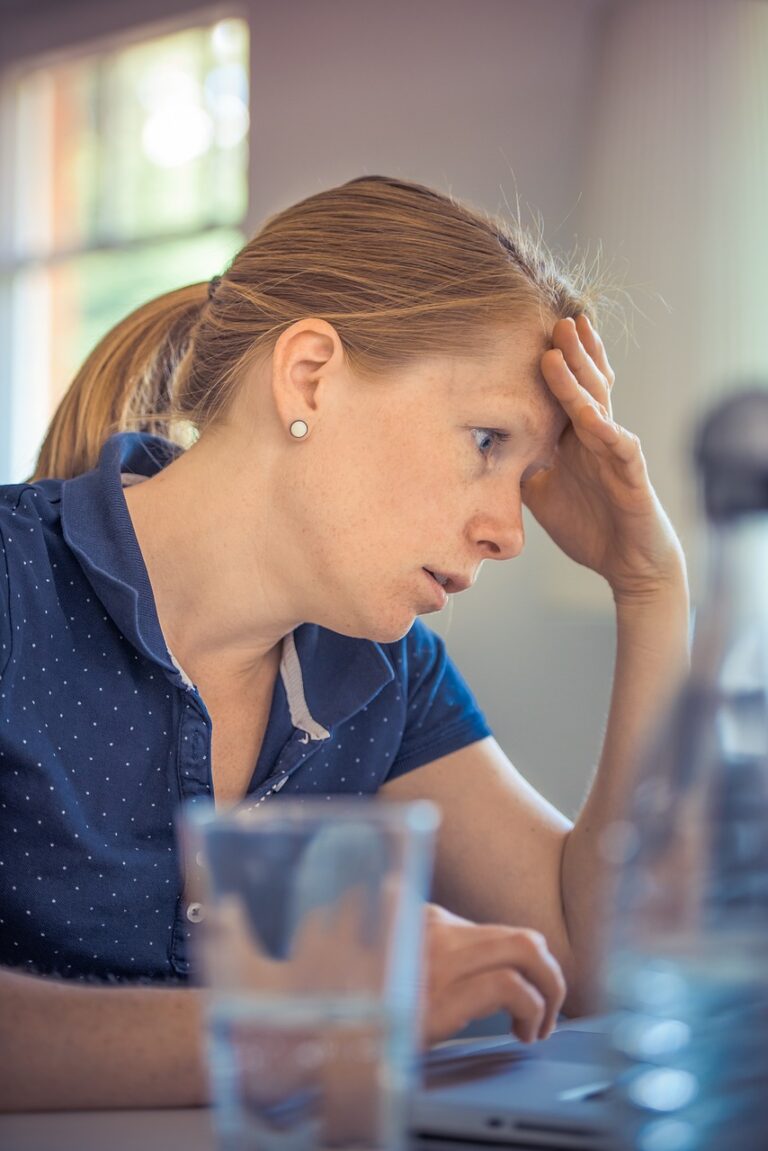 Woman noticeably anxious.